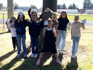 Students with homemade parachutes